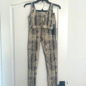 SMALL black & beige pant & bra workout set. 81% nylon, 19% spandex.